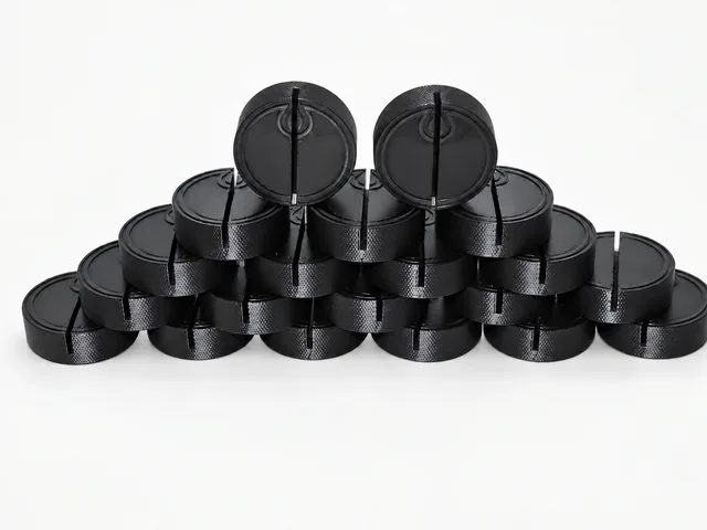 Black printed display holders arranged in a group